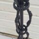 Black wrought iron floor lamp attributed to Gilbert Poillerat