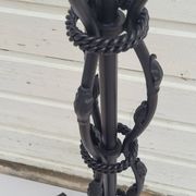 Black wrought iron floor lamp attributed to Gilbert Poillerat