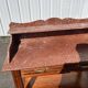 Meuble de toilette ancien en bois et marbre rouge