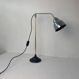 Old articulated industrial workshop lamp