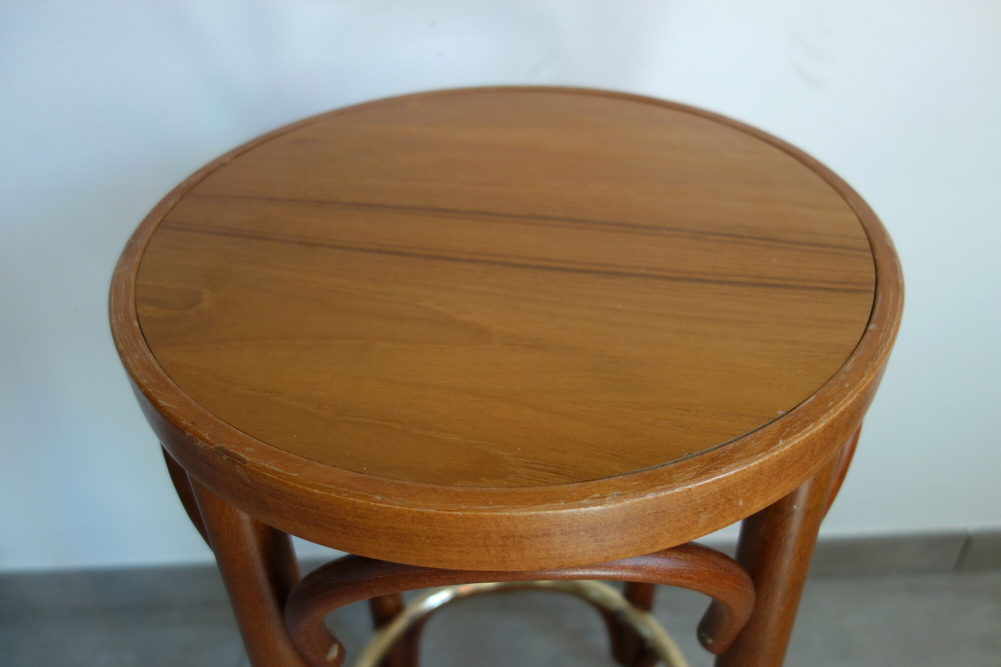 Former curved wooden bistro stool