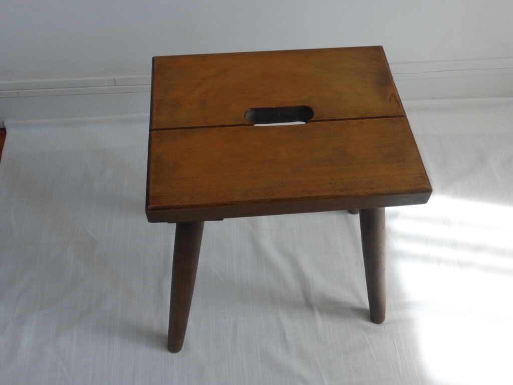 Massive wooden handle stool