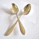 Set of 2 silver-plated teaspoons with a gold filigree design, 13.5 cm.