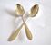 Set of 2 silver-plated teaspoons with a gold filigree design, 13.5 cm.