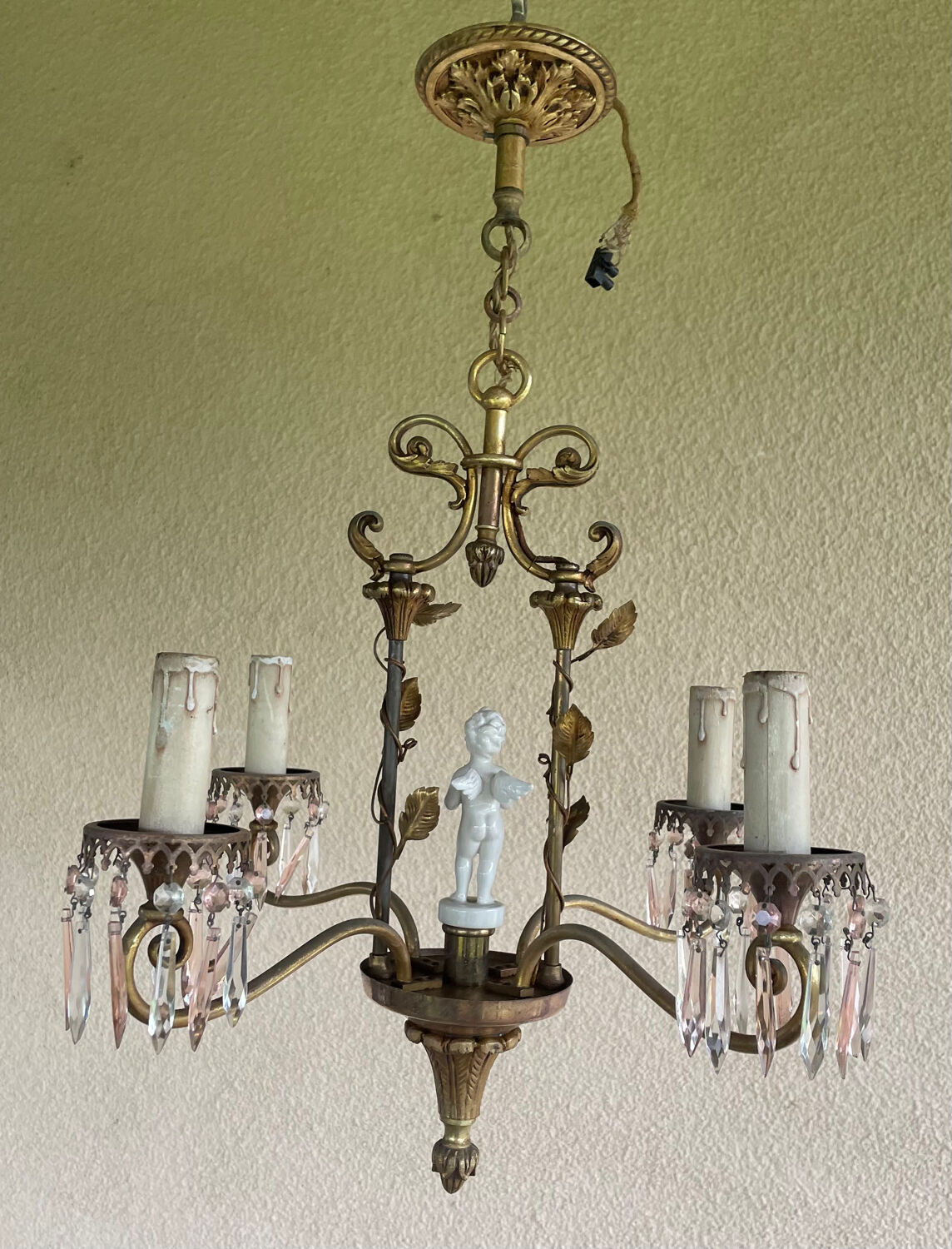 Antique bronze chandelier with porcelain angel.