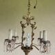 Lustre ancien en bronze italien avec ange en porcelaine.