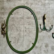 Rare set of swan neck coat hooks with mirror frame attributed to Maison Jansen, France, 1950s.