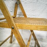 Folding chair with canne seat