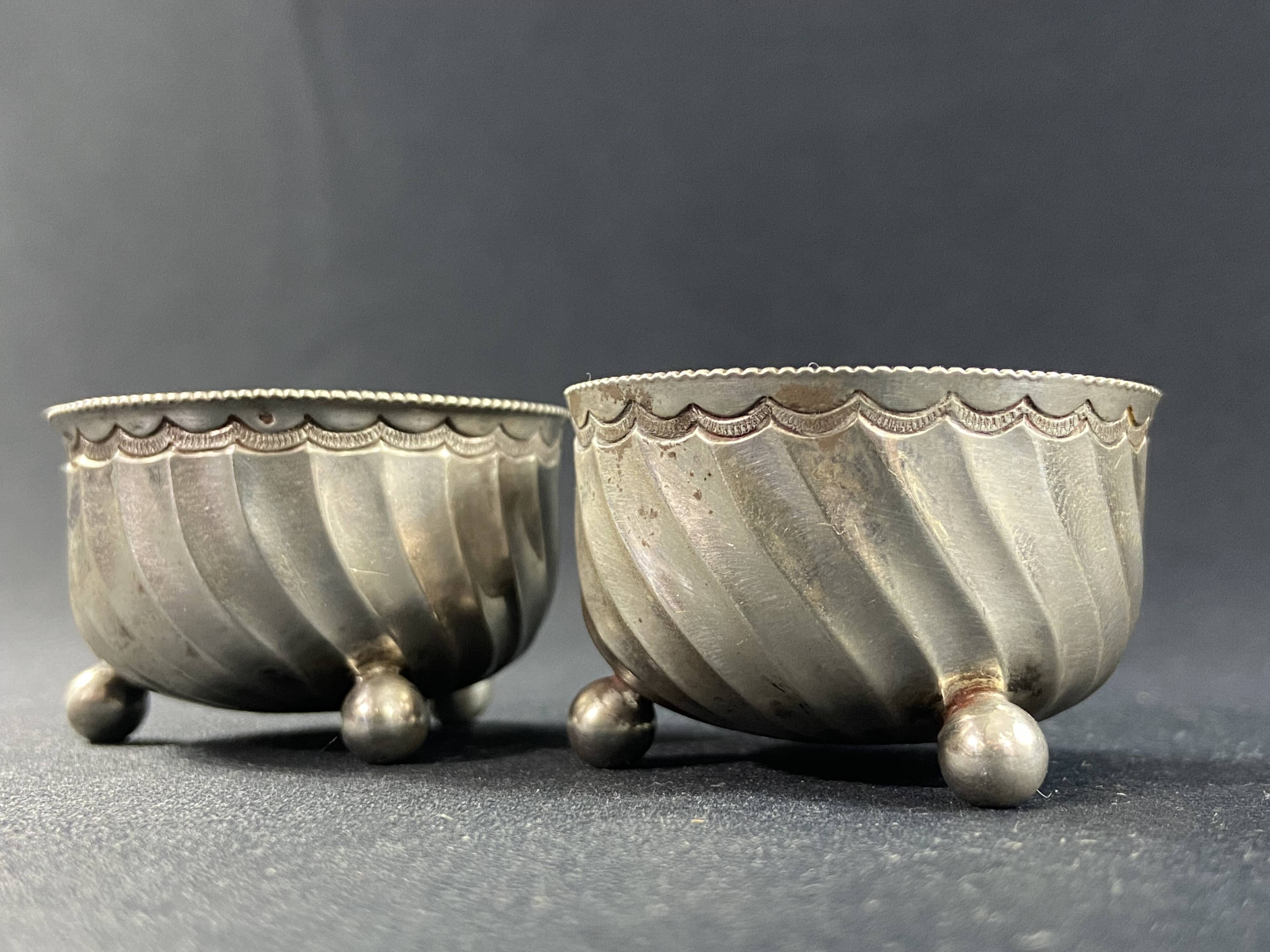 Pair of solid silver salt cellars with weevil hallmark