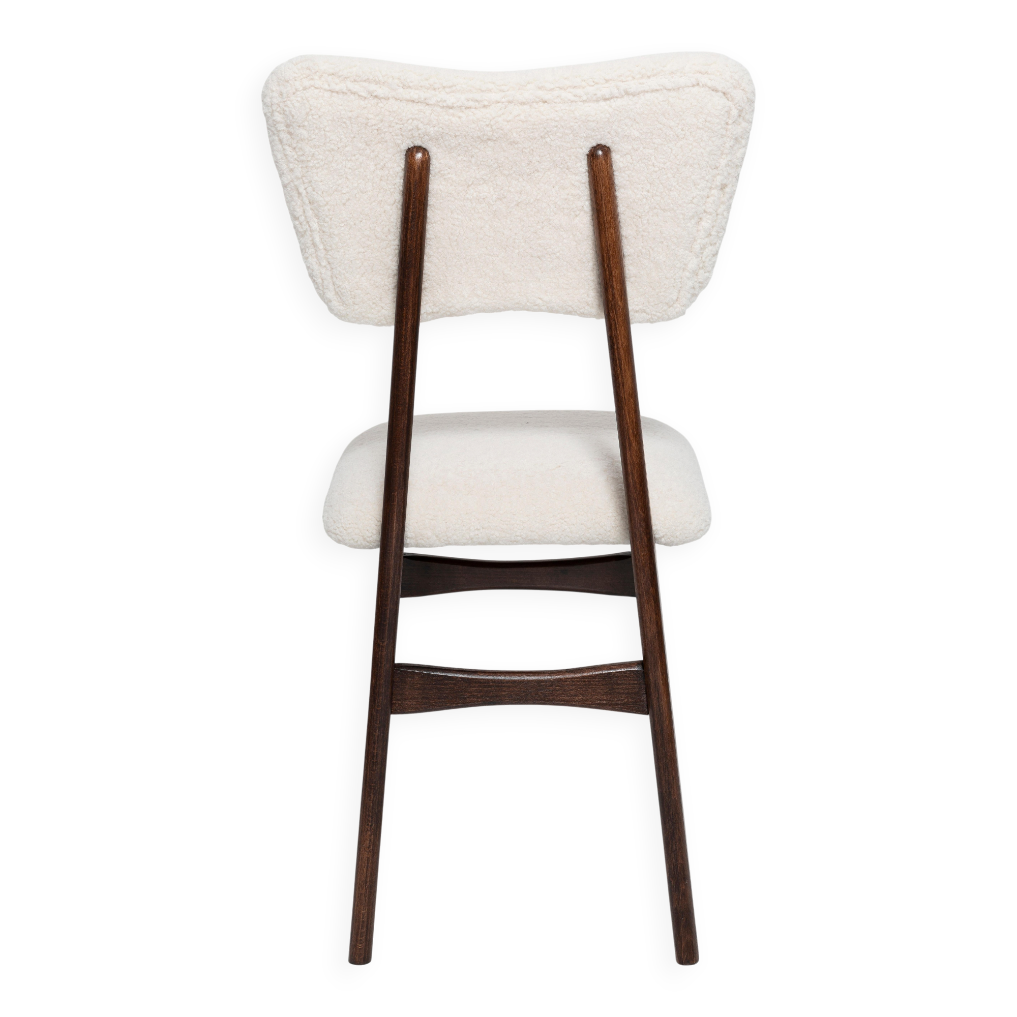 20th-century walnut and light cream boucle butterfly chair, Europe, 1960.