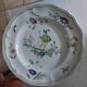 Assiette decorative en faience moustier Longchamp