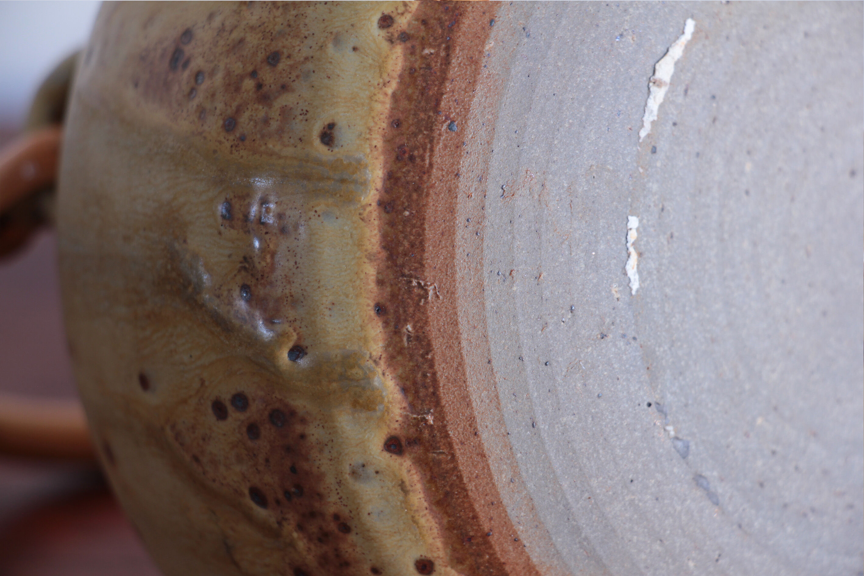 Sandstone teapot with rattan handle