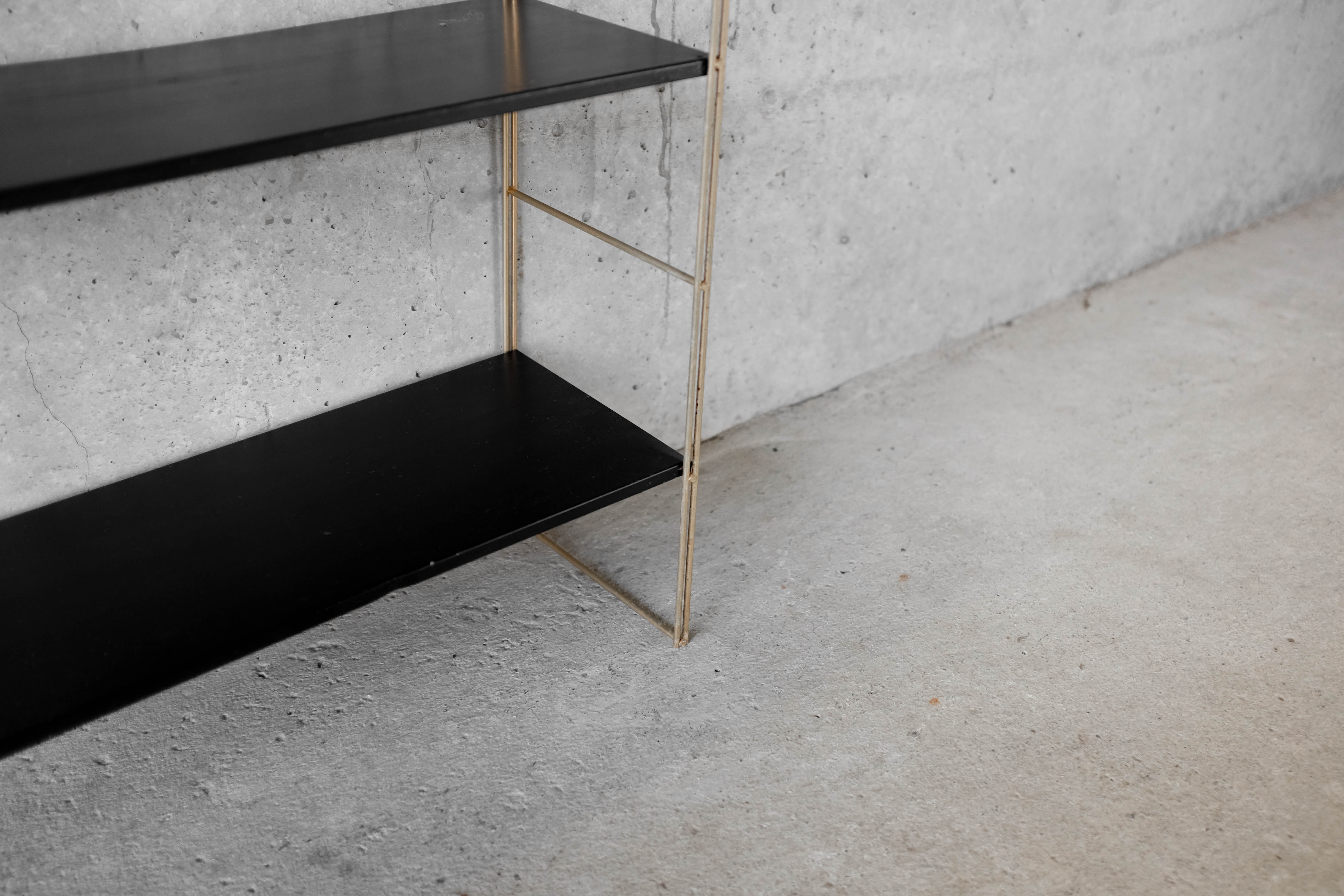 Brass string shelf