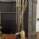 Golden metal fireplace tool set, 1970