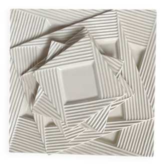 5 nesting plates by Paco Rabanne in Gien earthenware.