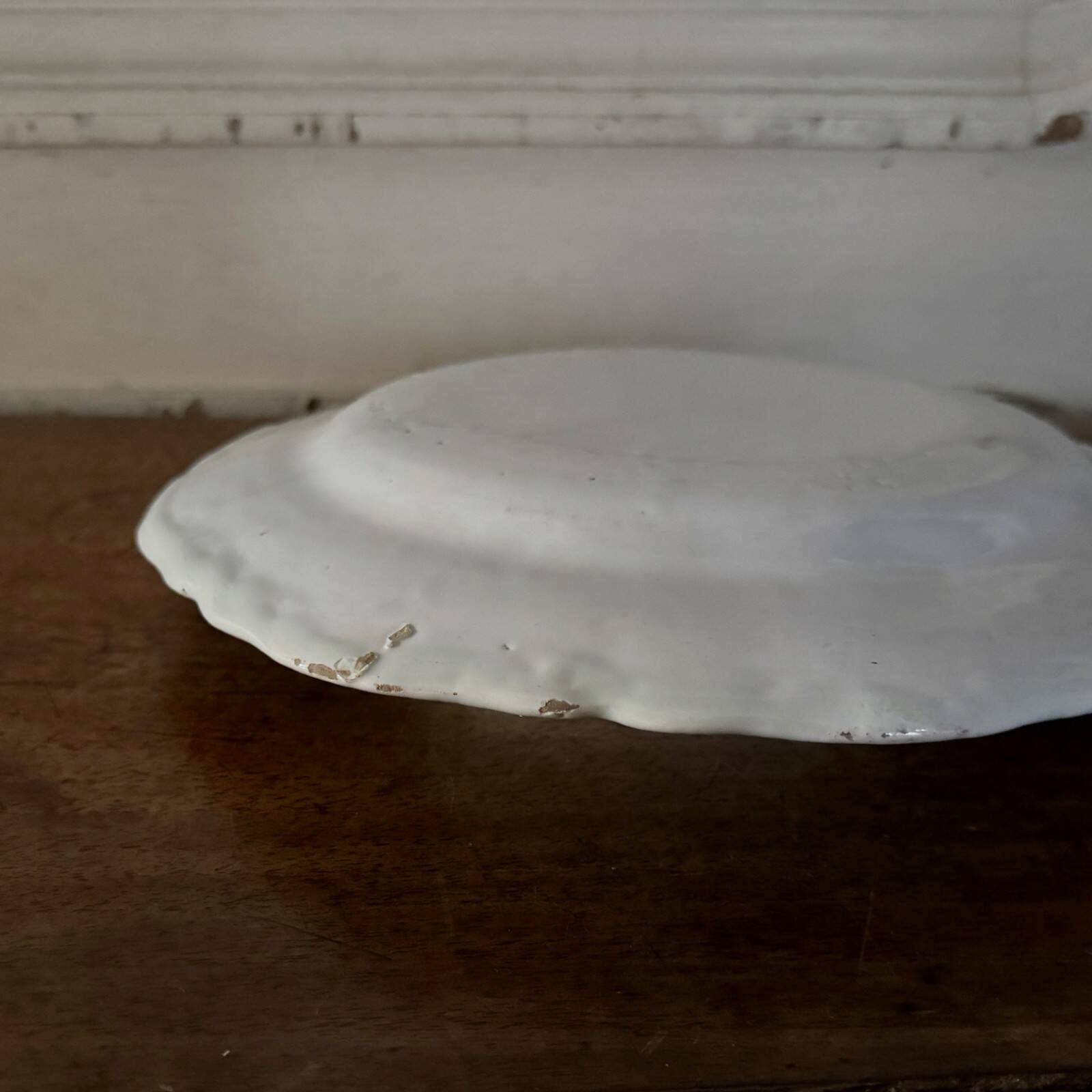 18th-century Moustiers earthenware plate with floral decoration