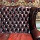 Chesterfield 2-seater leather-eared sofa from the 80s