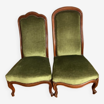 Pairs of green velvet armchairs