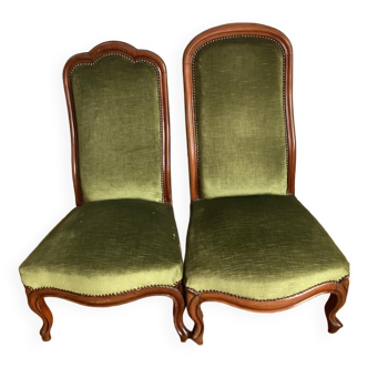 Pairs of green velvet armchairs
