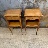 Pair of bedside tables with crossbow base