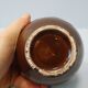 Ball solifleur in brown green ceramic