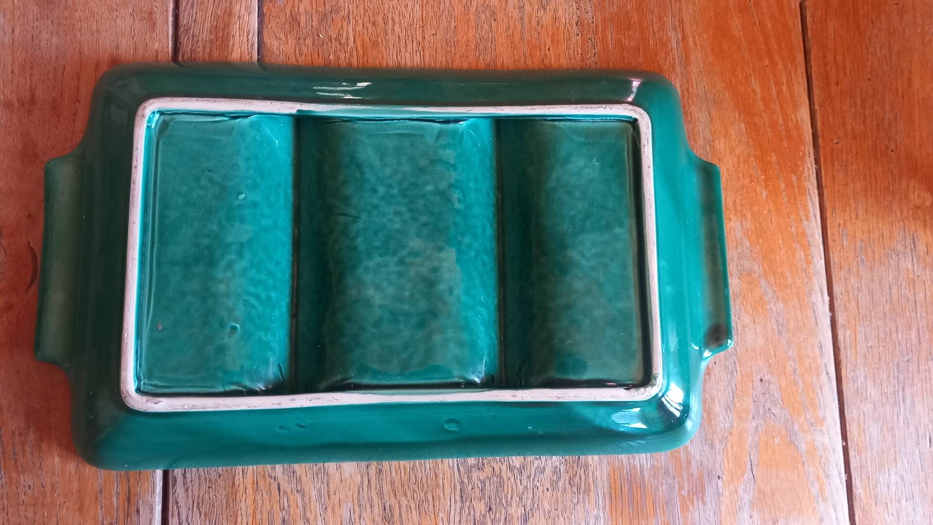 Glazed ceramic dish with compartments attributed to Poët-Laval.