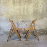 Pair of vintage folding wooden chairs