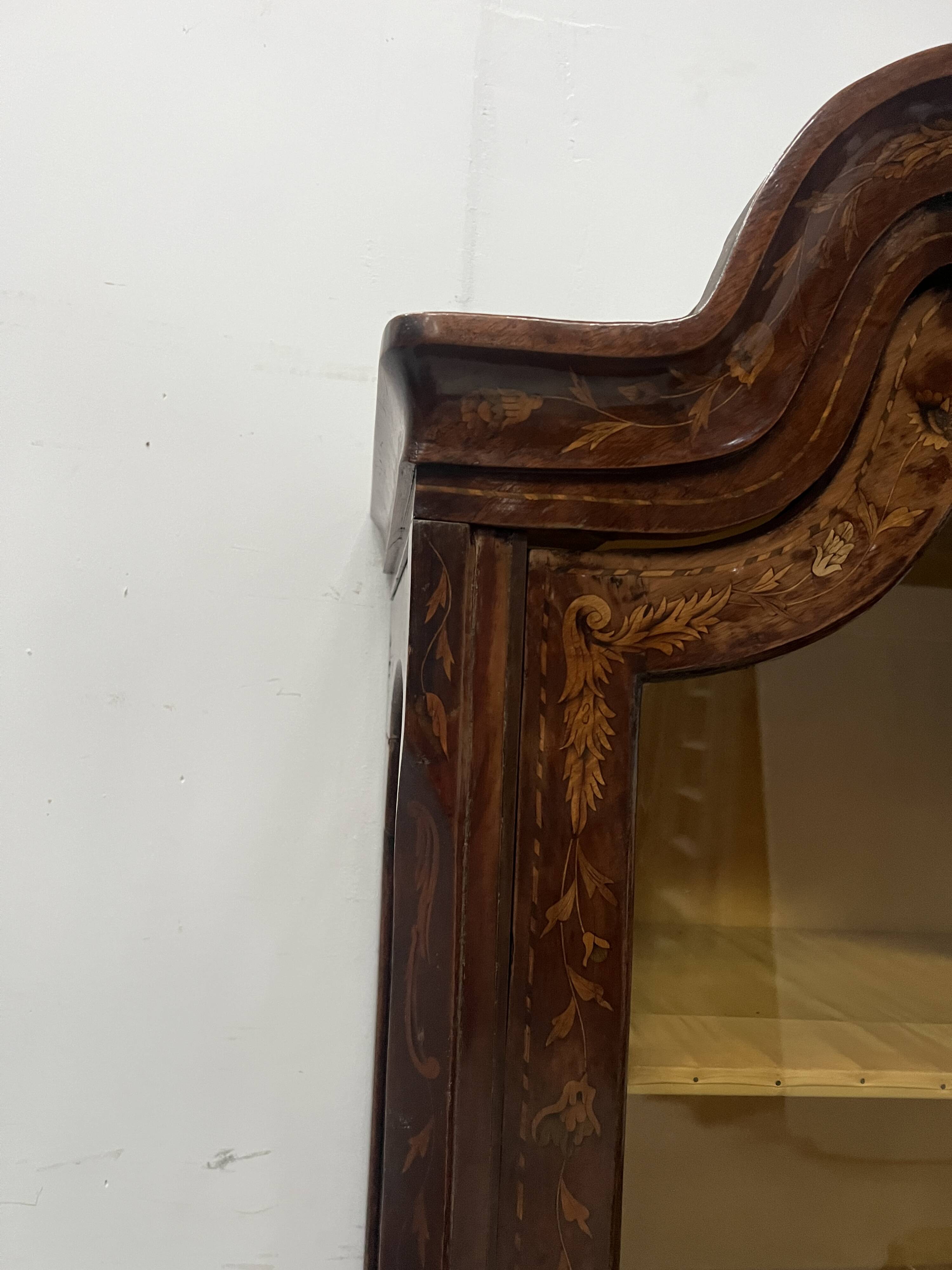 Dutch display cabinet in two parts made of marquetry wood.