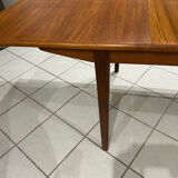 Large extendable Scandinavian table in vintage teak from the 1970s.