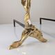 Pair of sculptural brutalist bronze fireplace andirons, 1970s