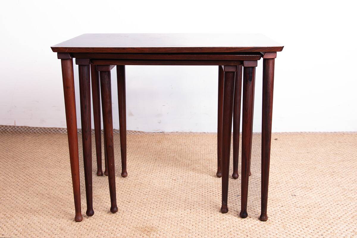 Three Danish nesting tables in rosewood by Mobelintersia 1960.