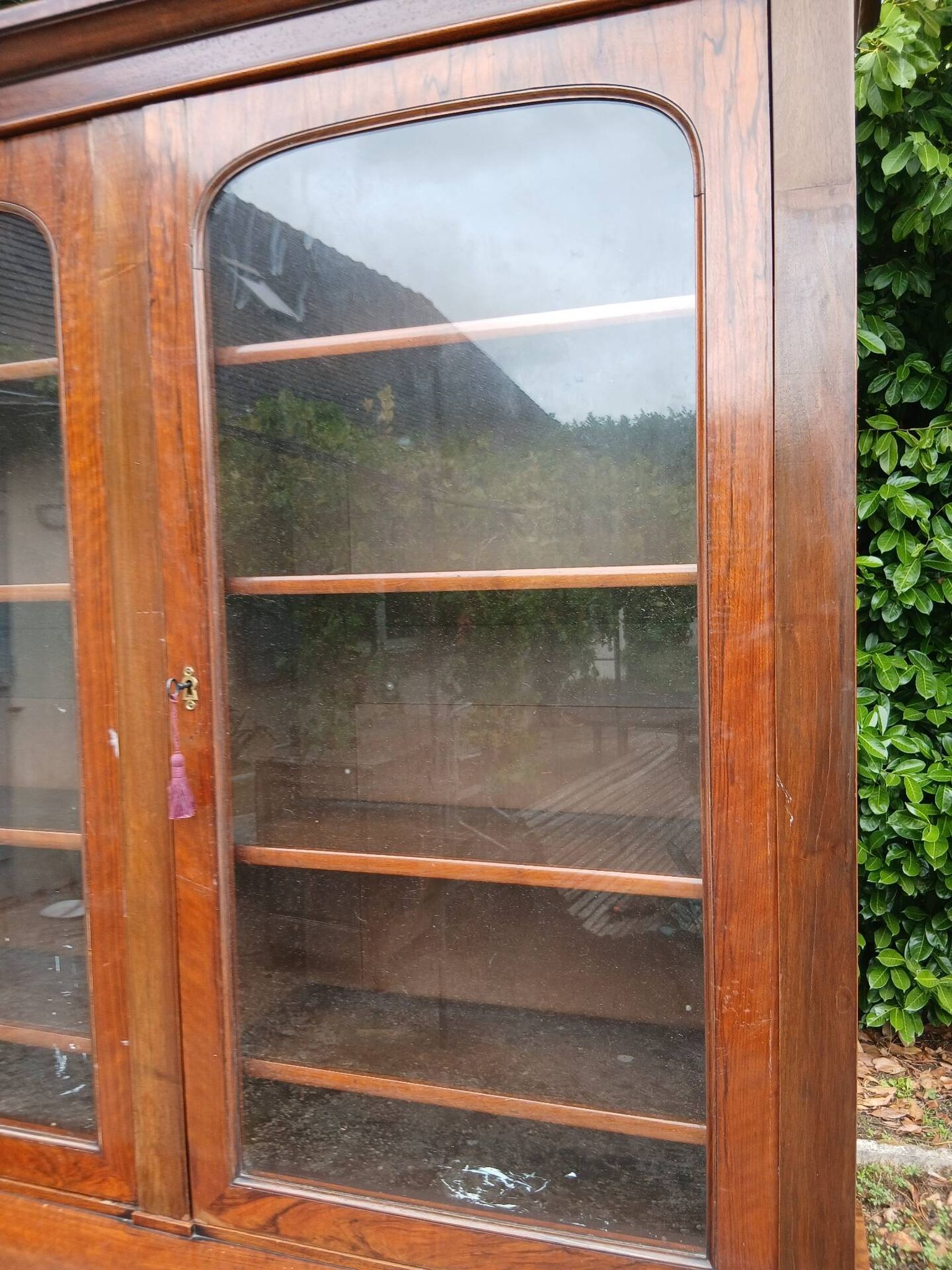 Large walnut shop library from the late 19th century.