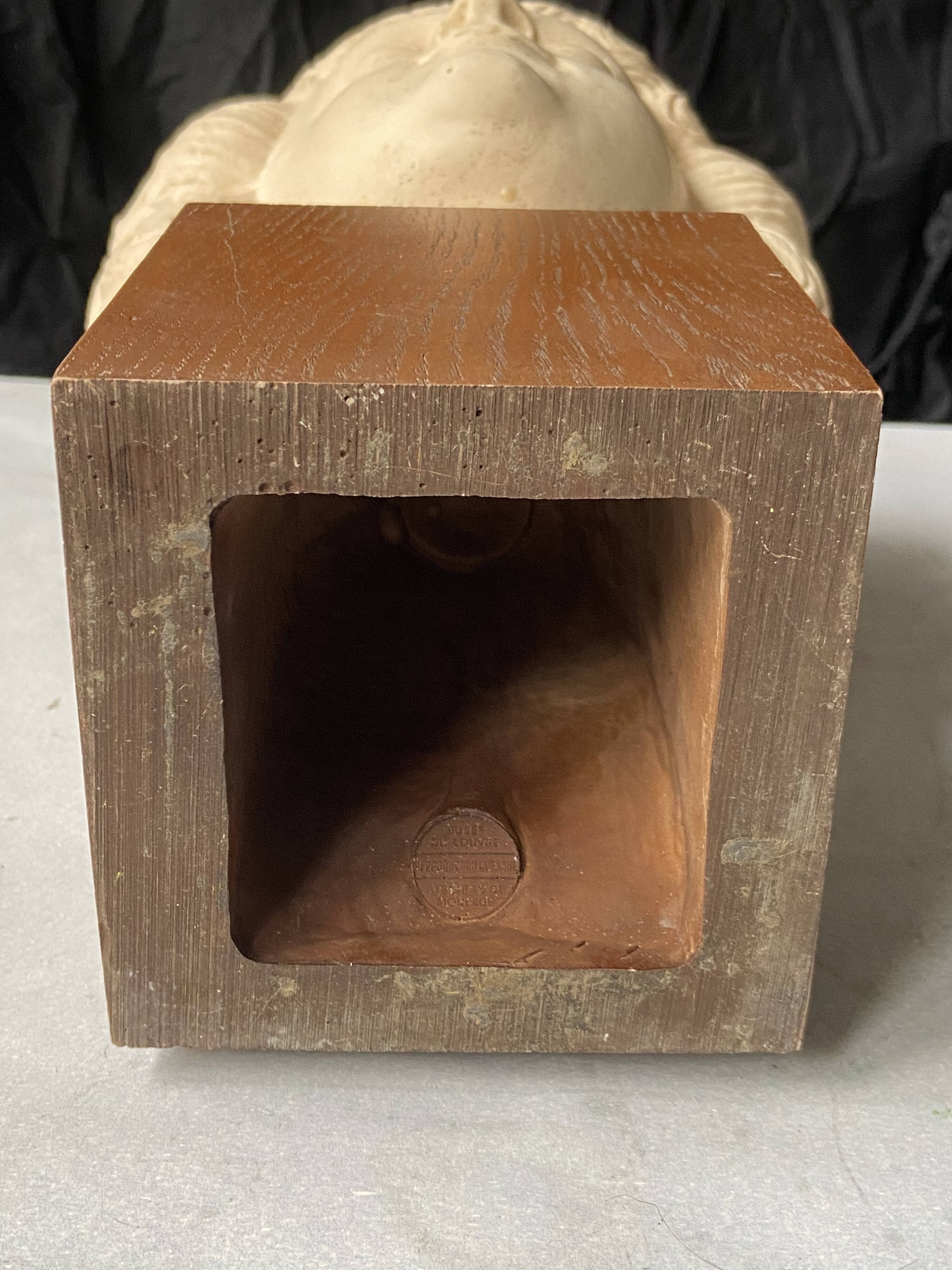 antique head sculpture Louvre Museum