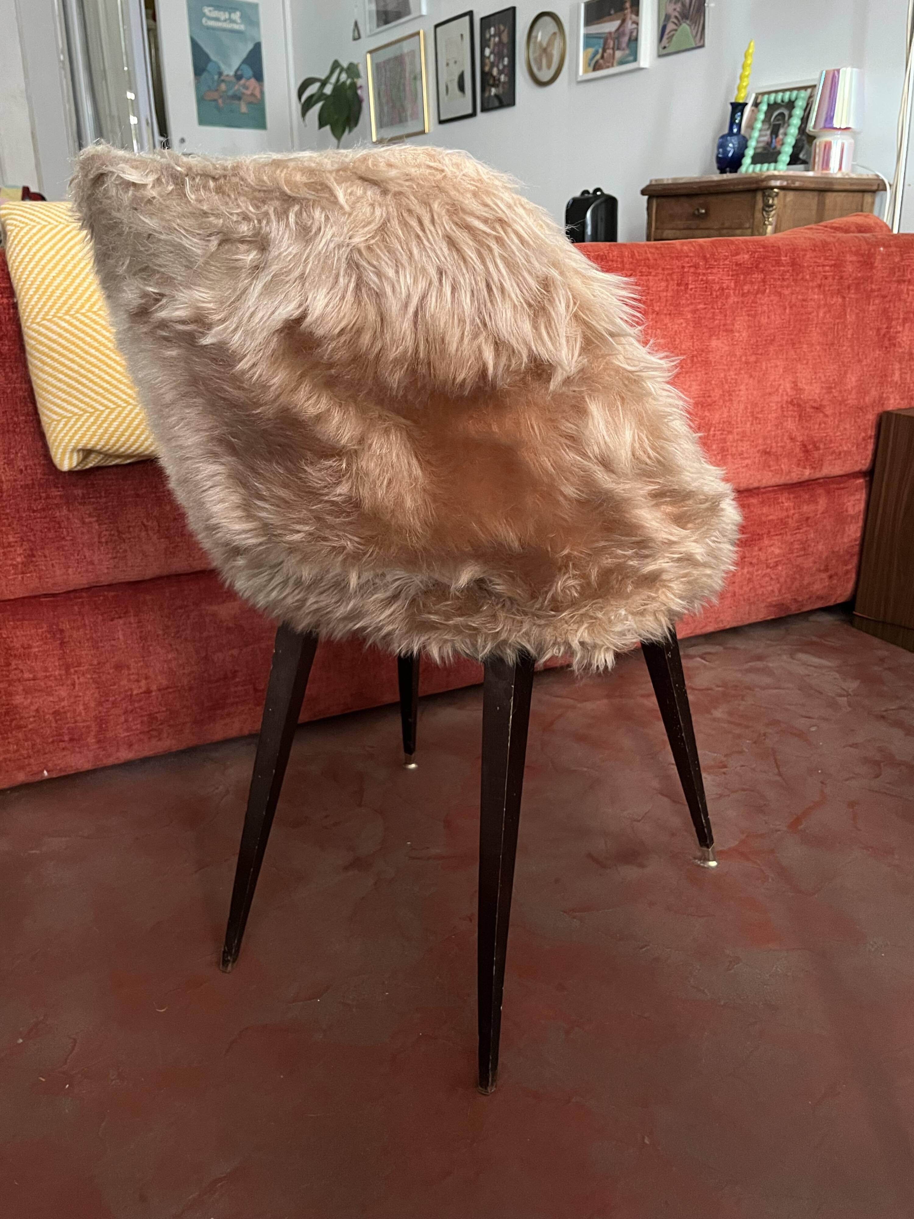 70s faux fur chair with tapered legs in powder pink