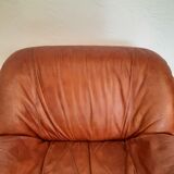 Four vintage armchairs, leather and fabric, 70s