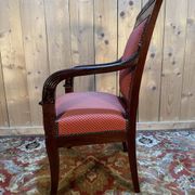 Fauteuil époque Empire en acajou pieds sabres