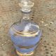 Blue granite glass carafe with vintage gold trim.