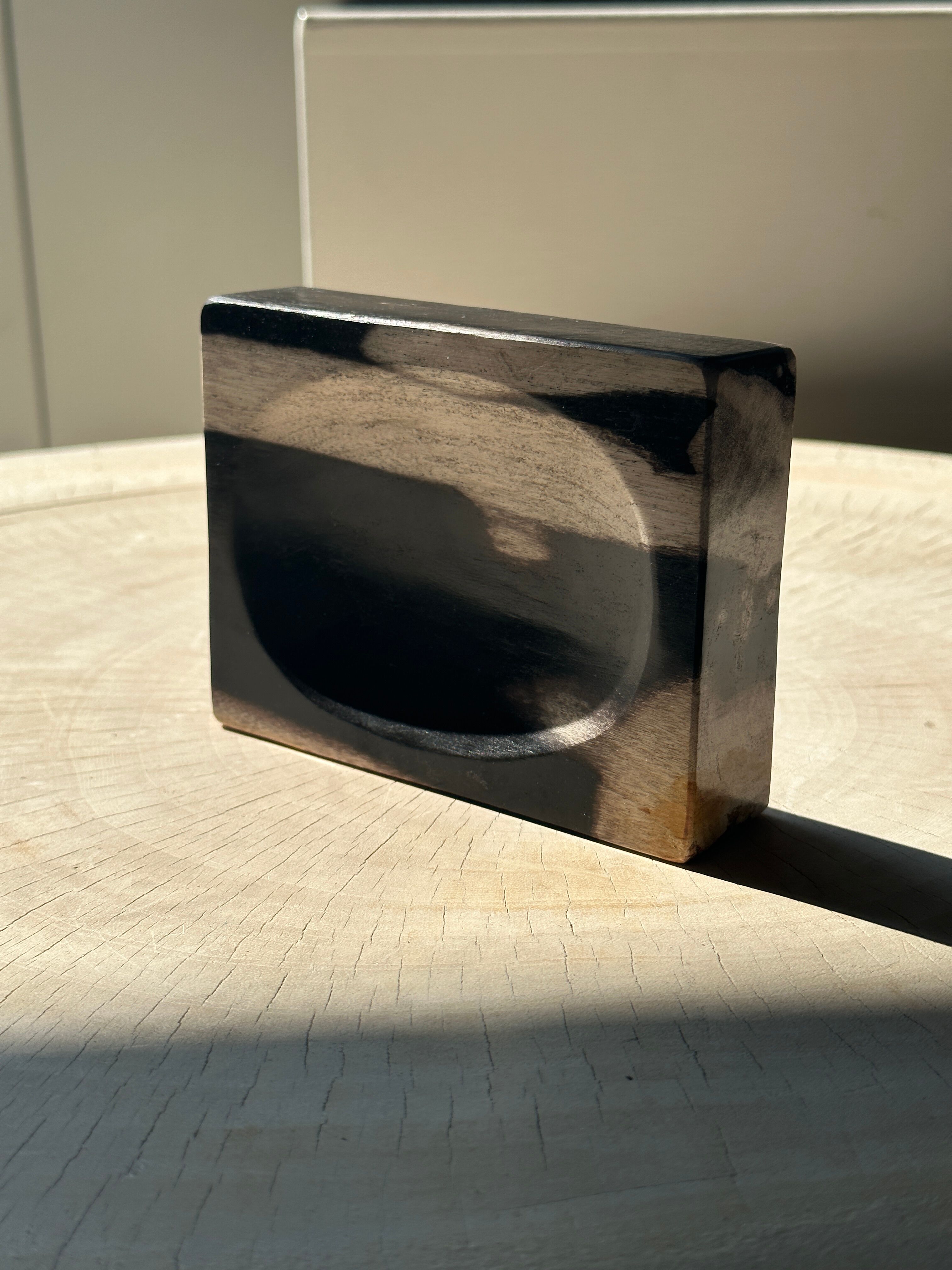Symmetrical multicolored petrified wood soap dish