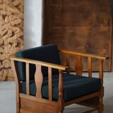 Art Nouveau, pair of oak lounge chairs, reupholstered in style fabric, 1920s.