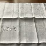 Tablecloth and 12 linen towels marked AA
