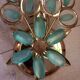 Gold metal wall light with light blue tassels