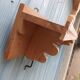 Antique carved wooden wall shelf