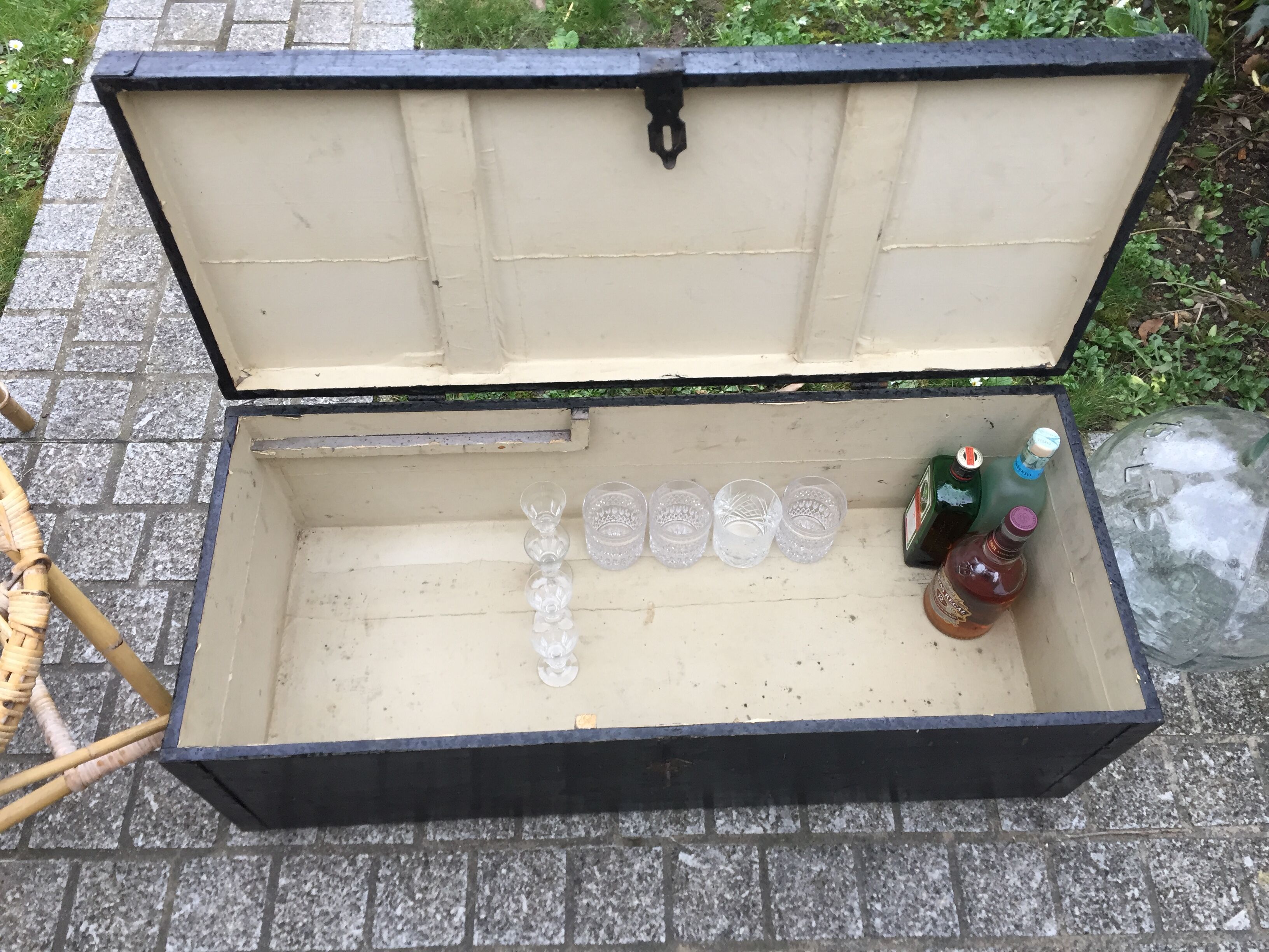 Old chest or wooden trunk black patina