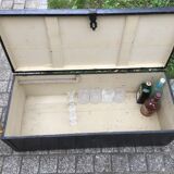 Old chest or wooden trunk black patina