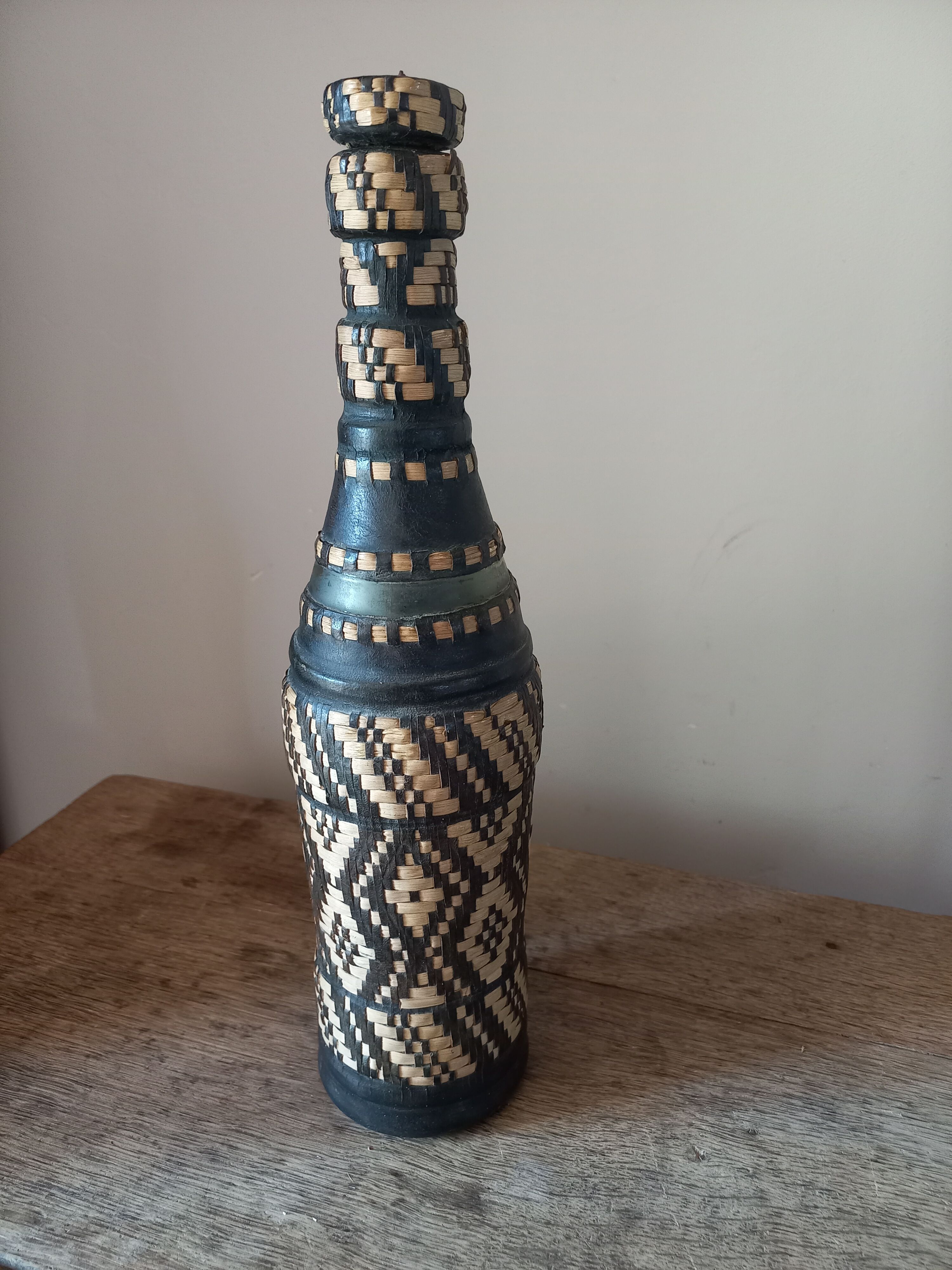 Bottle vase sheathing braided basketry and leather Ethnic Crafts