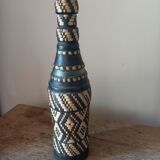 Bottle vase sheathing braided basketry and leather Ethnic Crafts