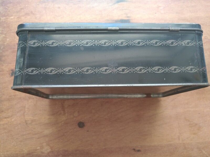 Vintage black art deco metal box with fish decoration