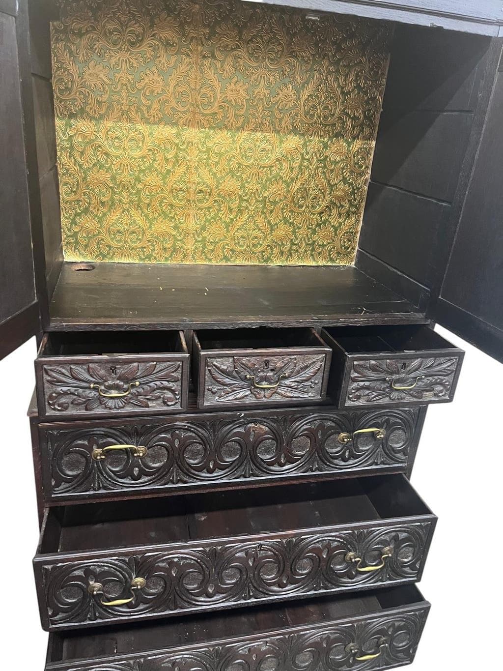 Antique tall wardrobe in dark carved wood / bohemian wardrobe