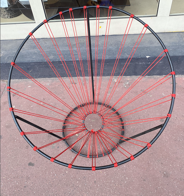 Red rope "cockroach" chair