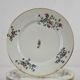 6 flat plates decorated with barbs